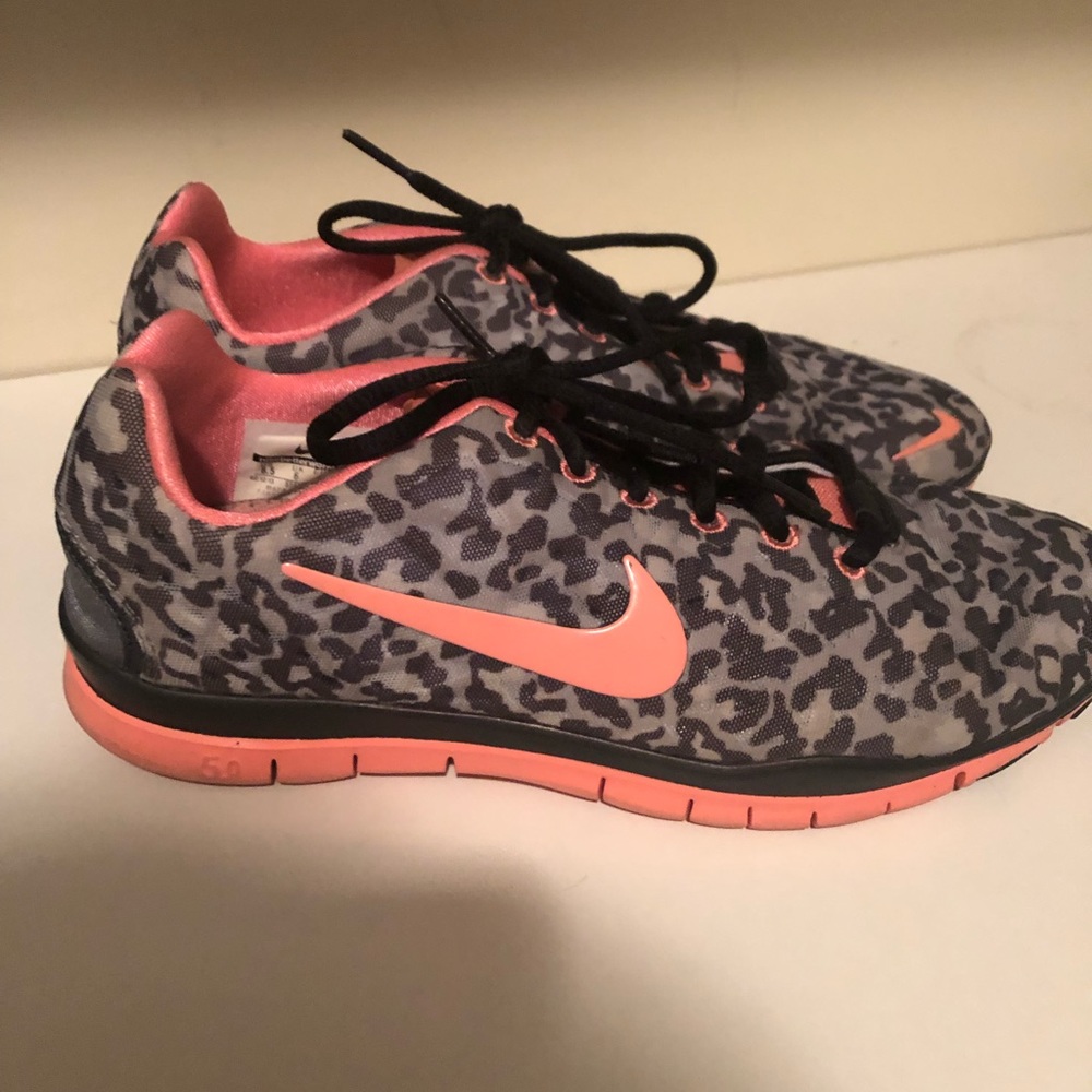 Grey and pink ray leopard Nike.